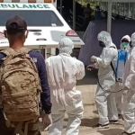 Kapolsek Pandan AKP Zulkarnaen Pohan Melakukan Pengawalan Terhadap Pemakaman Pasien Covid-19